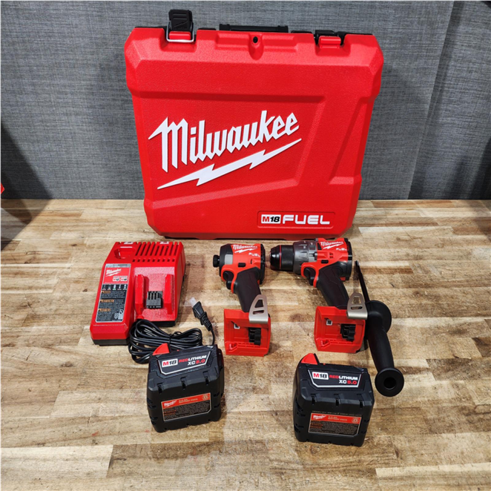Houston Location AS-IS Milwaukee FUEL 18V Lithium-Ion Brushless Cordless Hammer Drill and Impact Driver Combo Kit