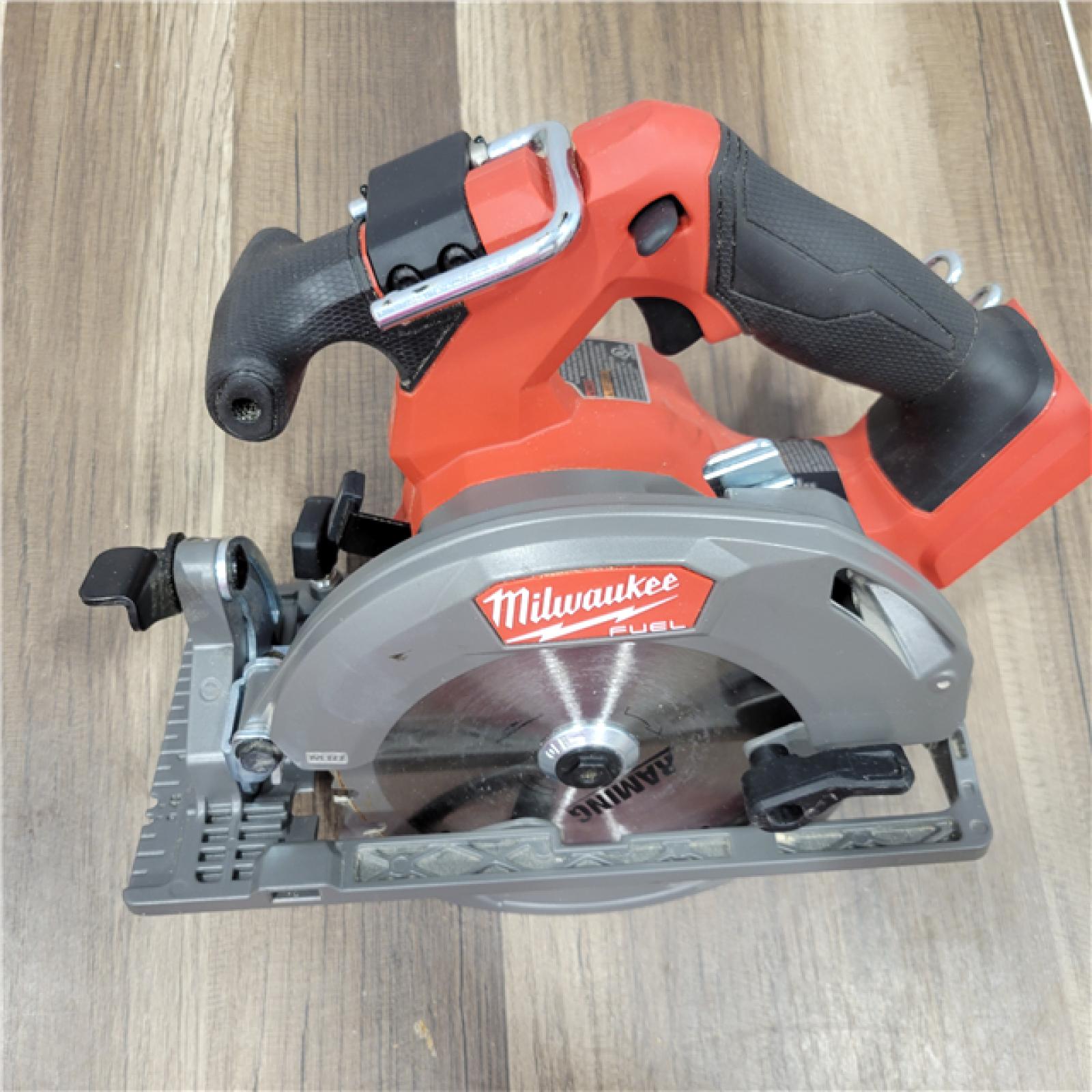 AS-IS Milwaukee M18 FUEL 18V Lithium-Ion Brushless Cordless 6-1/2 in. Circular Saw (Tool-Only)