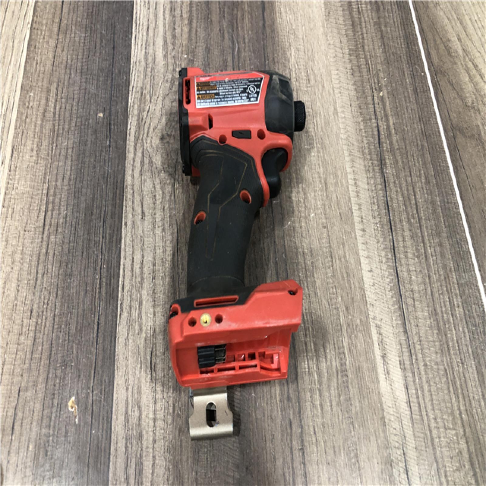 AS-IS  Milwaukee FUEL SURGE 18V Lithium-Ion Brushless Cordless 1/4 in. Hex Impact Driver (Tool-Only)