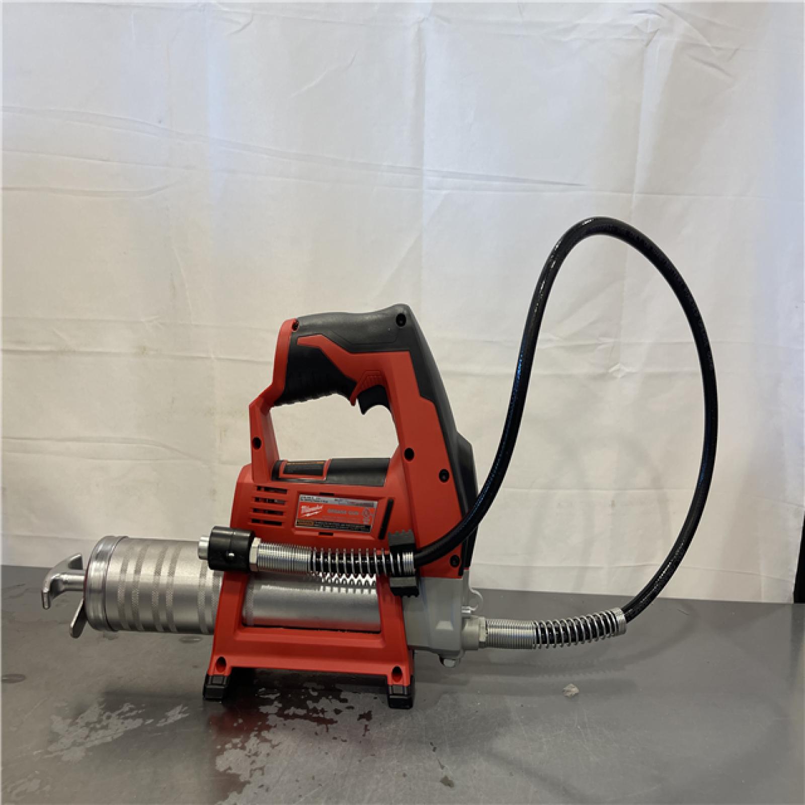 AS-IS- Milwaukee M12 12V Cordless Grease Gun (Tool Only)