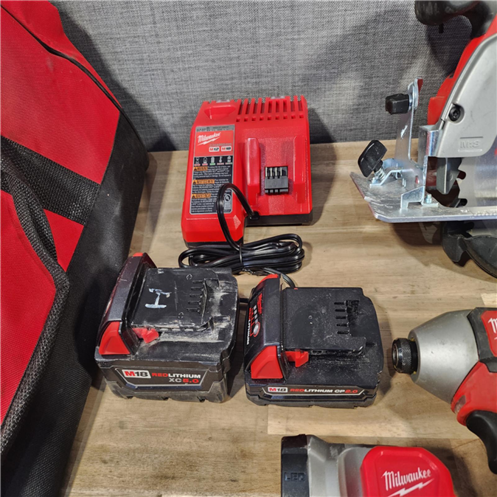 HOUSTON LOCATION - AS-IS MILWAUKEE 8 TOOL COMBO KIT W/ (2) BATTERY & CHARGER