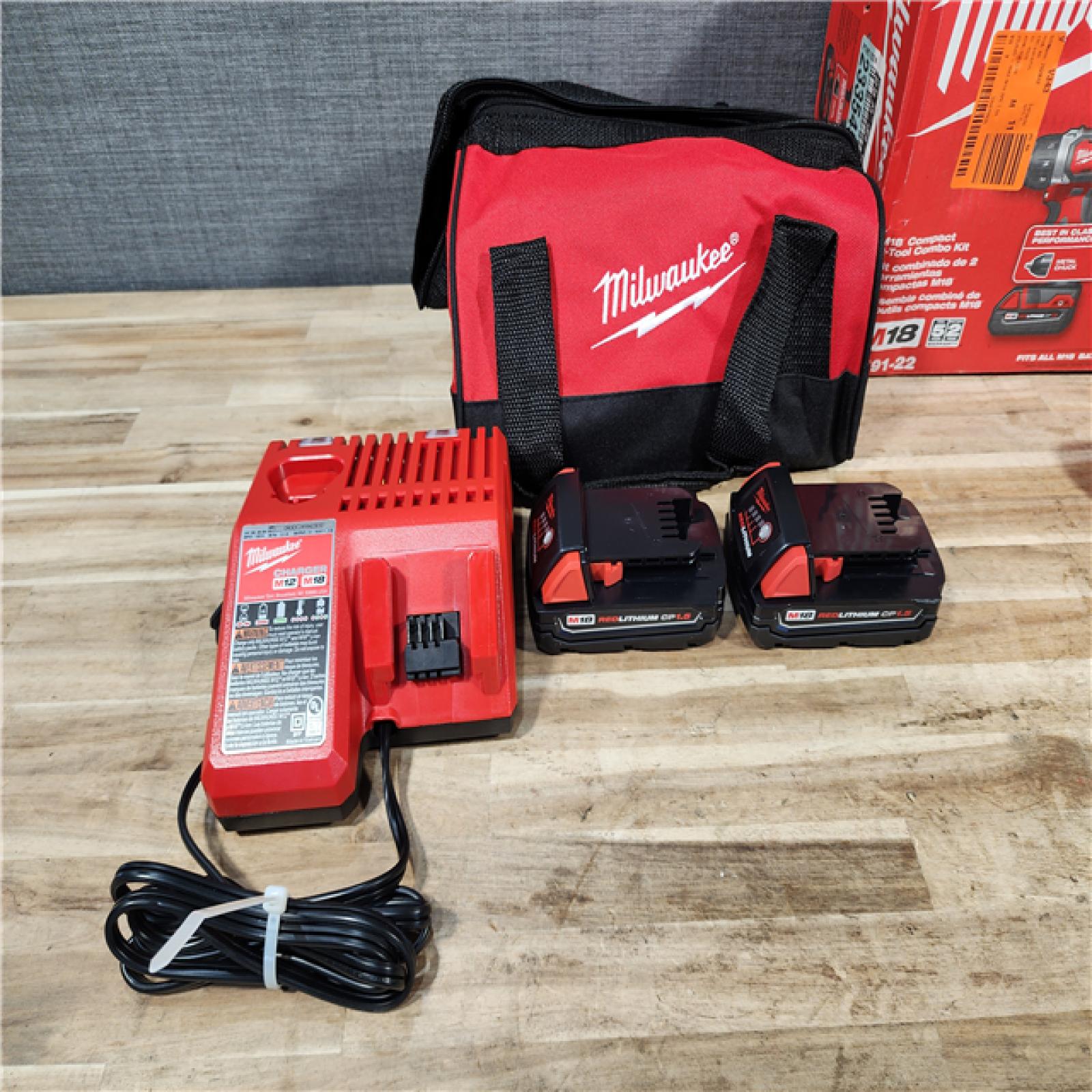 HOUSTON LOCATION - AS-IS Milwaukee 18V Lithium-Ion Cordless Drill Driver/Impact Driver Combo Kit