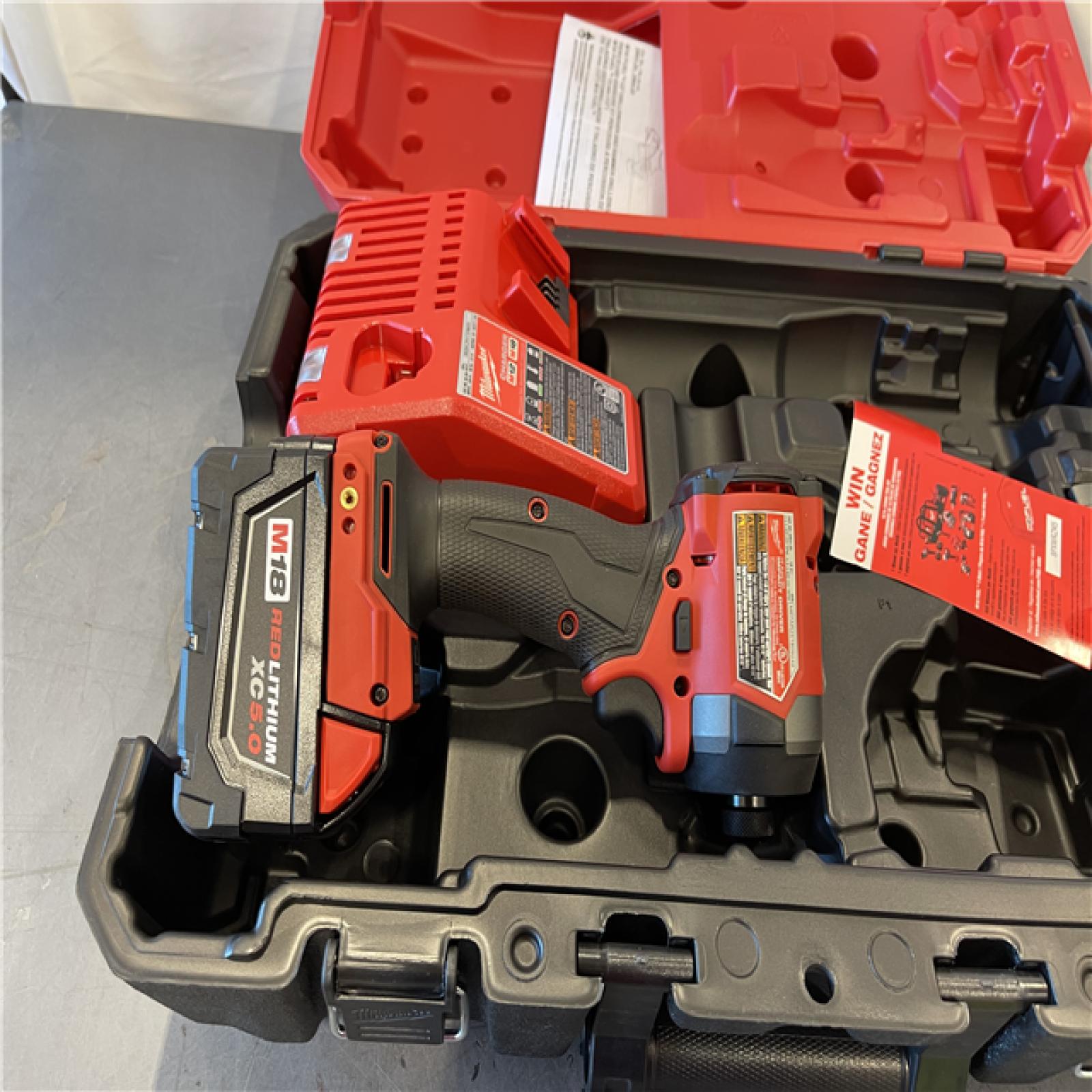 AS-IS - Milwaukee M18 FUEL 18-Volt Lithium Ion Brushless Cordless 1/4 in. Hex Impact Driver Kit
