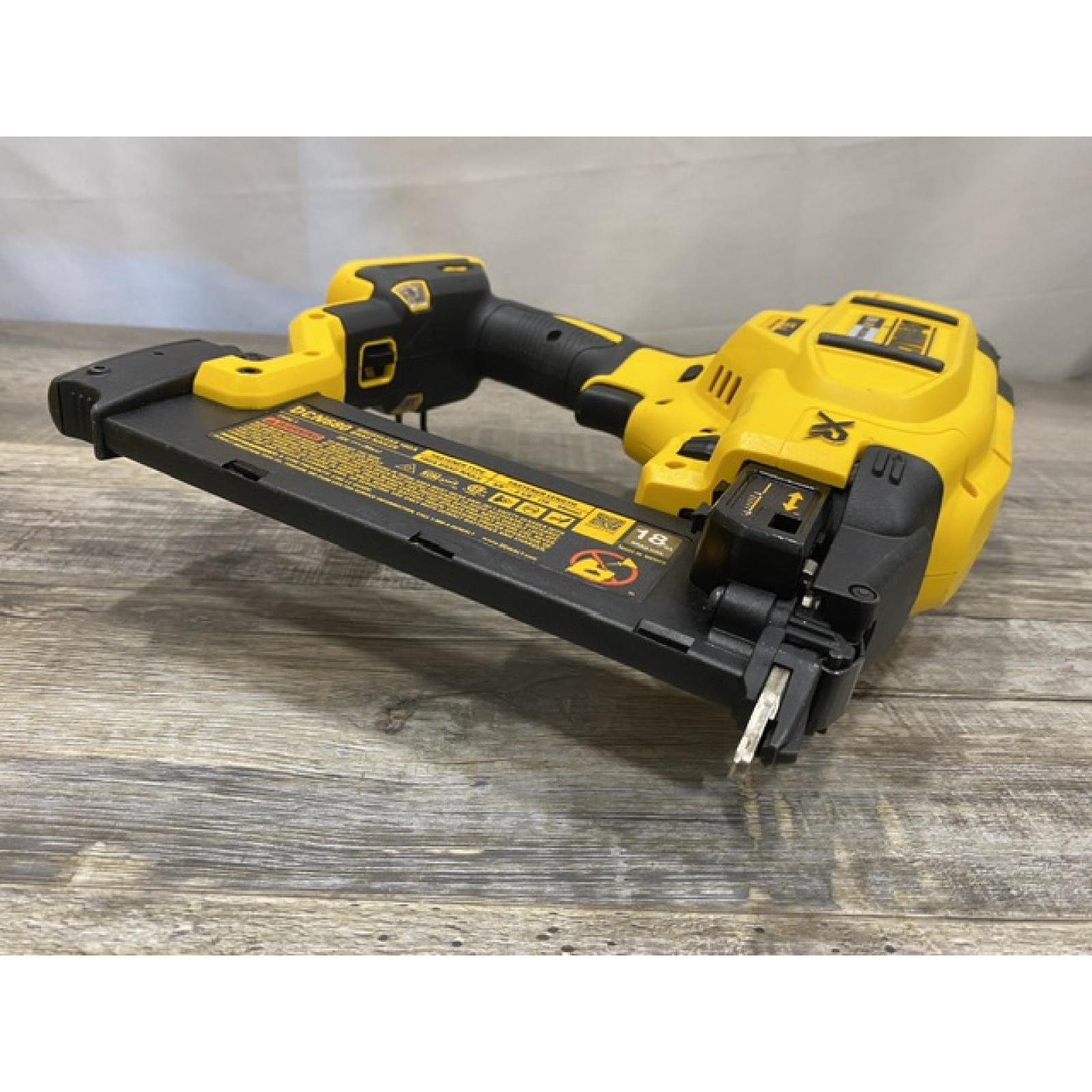 AS-IS DEWALT 20V MAX XR Lithium-Ion Electric Cordless 18-Gauge Brad Nailer (Tool Only)