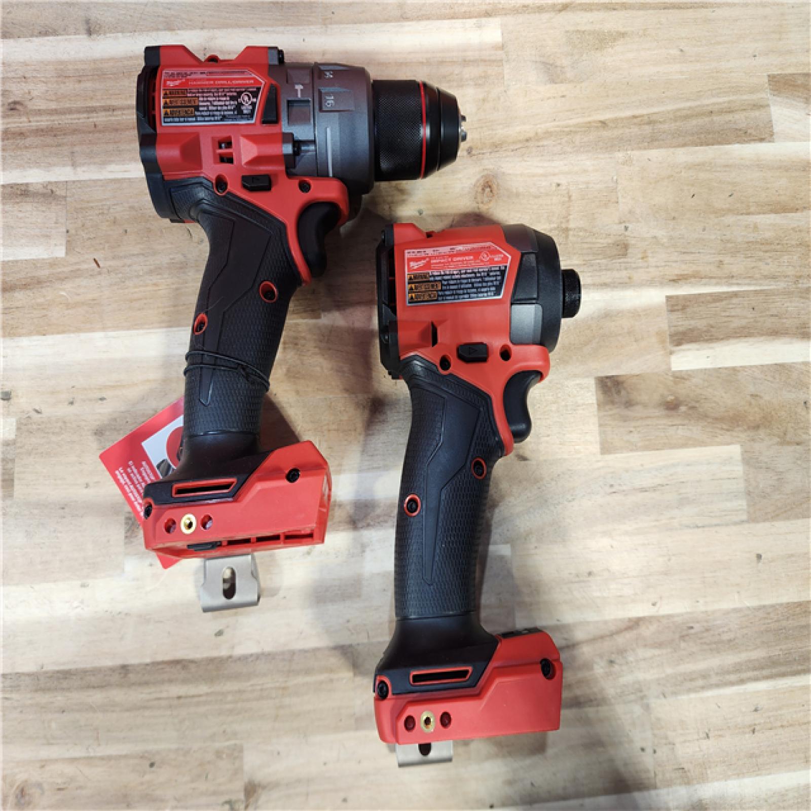 HOUSTON LOCATION - AS-IS (APPEARS LIKE NEW) Milwaukee  FUEL 18V Lithium-Ion Brushless Cordless Hammer Drill and Impact Driver Combo Kit