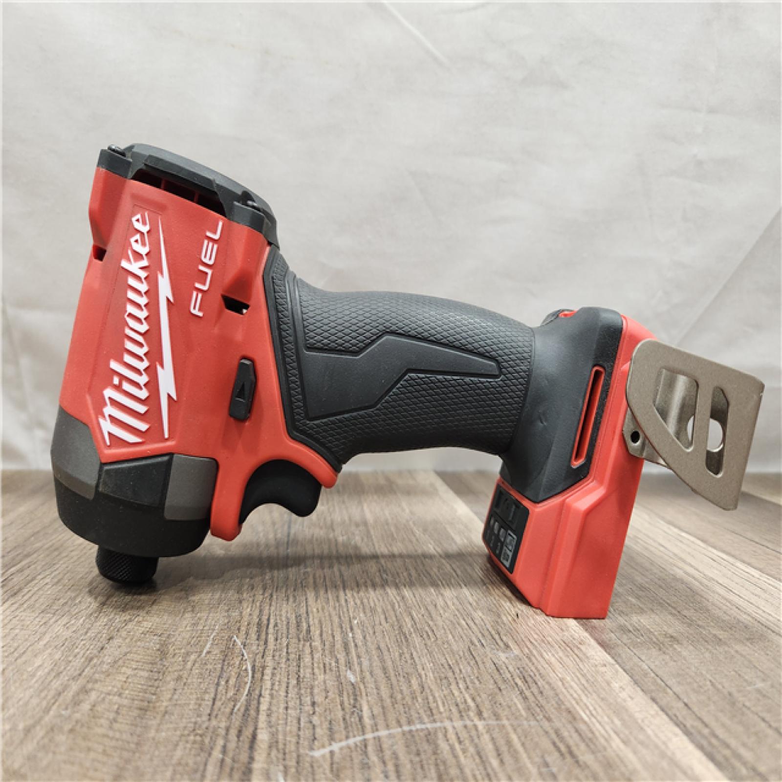 AS-IS- Milwaukee 18V Lithium-Ion Brushless Cordless 1/4 Hex Impact Driver (Tool-Only)