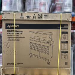 DALLAS LOCATION - Husky 46 in. x 25 in. D 9-Drawer Mobile Workbench with Adjustable Height Wood Top in Gloss Black