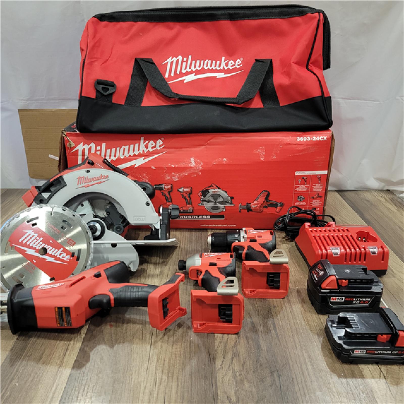 AS-IS Milwaukee M18 18-Volt Lithium-Ion Brushless Cordless Combo Kit (4-Tool) with 2-Batteries, 1-Charger and Tool Bag