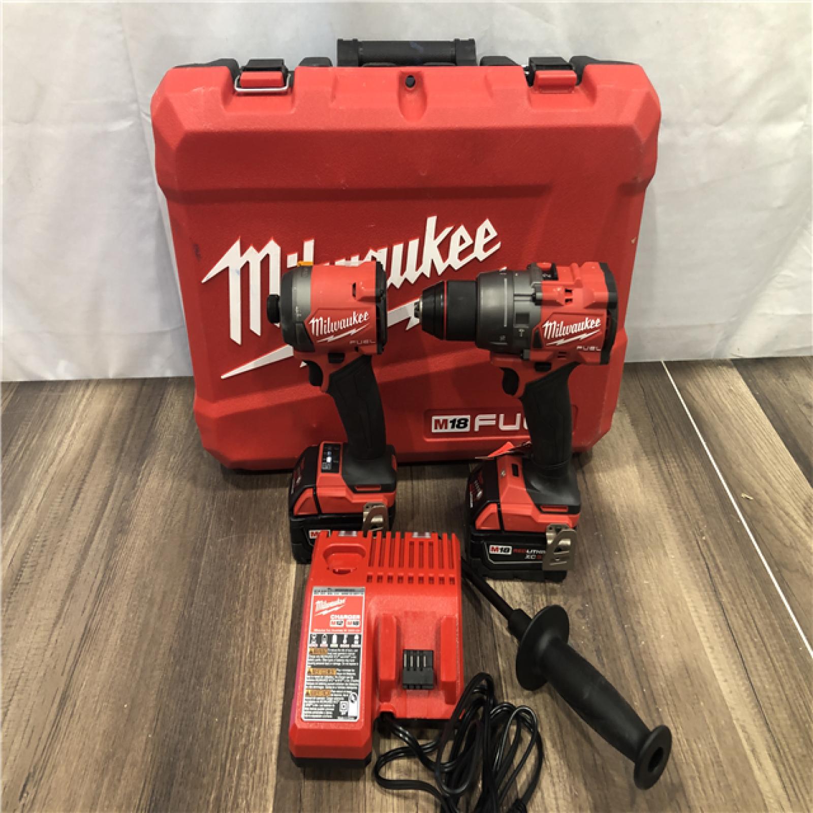AS-IS Milwaukee FUEL 18V Lithium-Ion Brushless Cordless Hammer Drill and Impact Driver Combo Kit