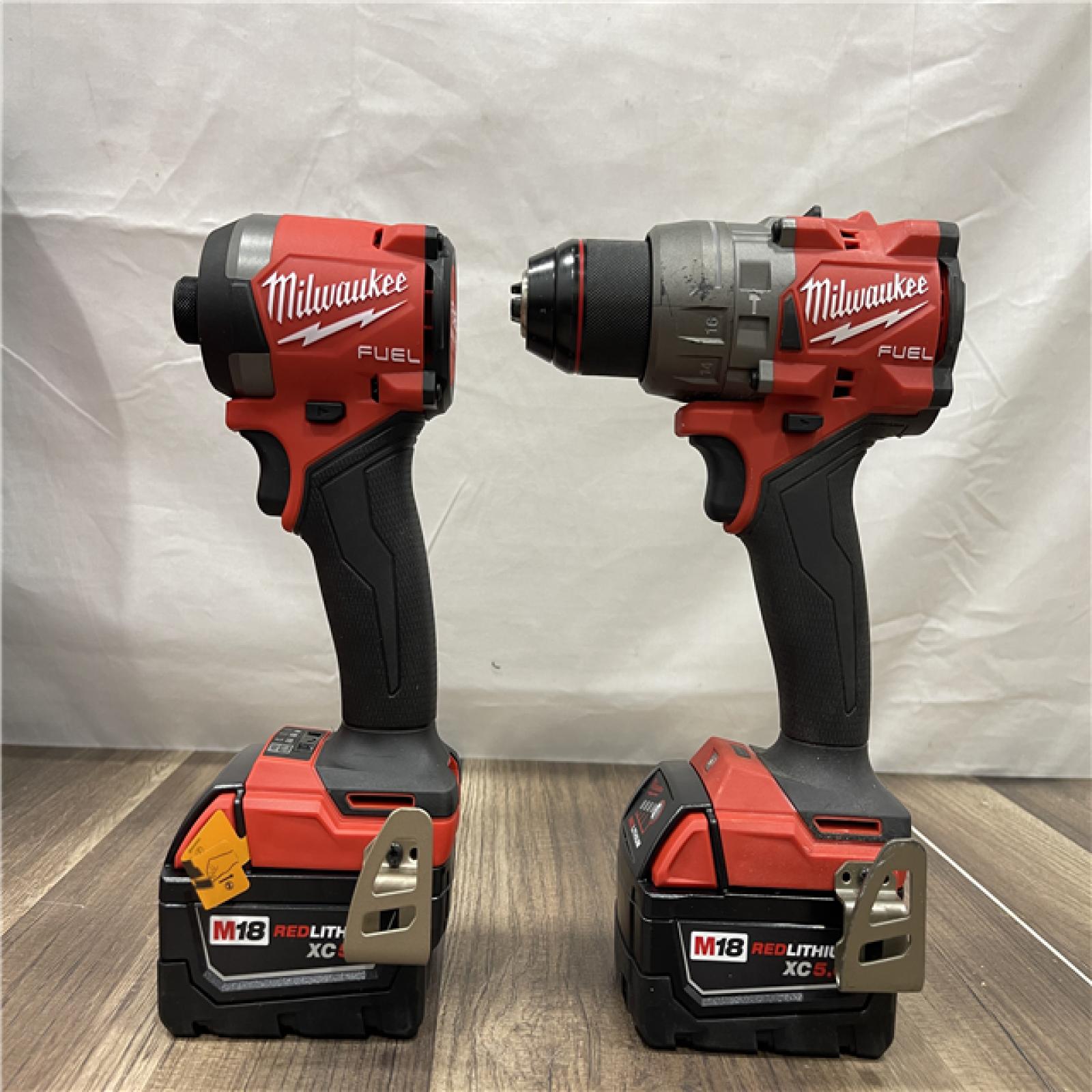 AS-IS Milwaukee M18 FUEL 18V Lithium-Ion Brushless Cordless Hammer Drill and Impact Driver Combo Kit