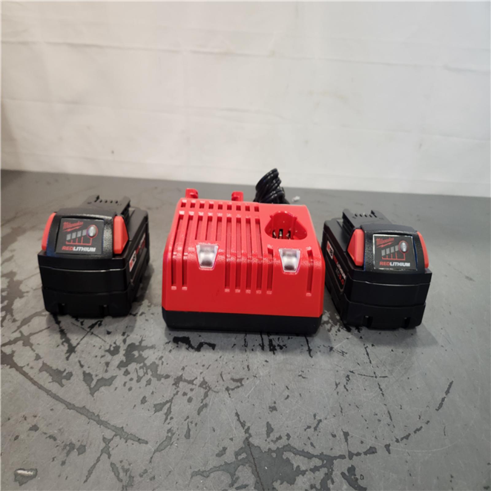 AS-IS- Milwaukee M18 18-Volt Lithium-Ion XC Starter Kit with Two 5.0Ah Batteries and Charger