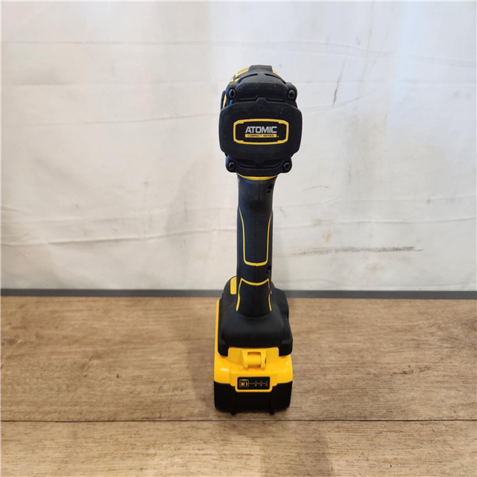 AS-IS- DEWALT ATOMIC 20V MAX Lithium-Ion Cordless 1/4 in. Brushless Impact Driver Kit  5 Ah Battery  Charger  and Bag