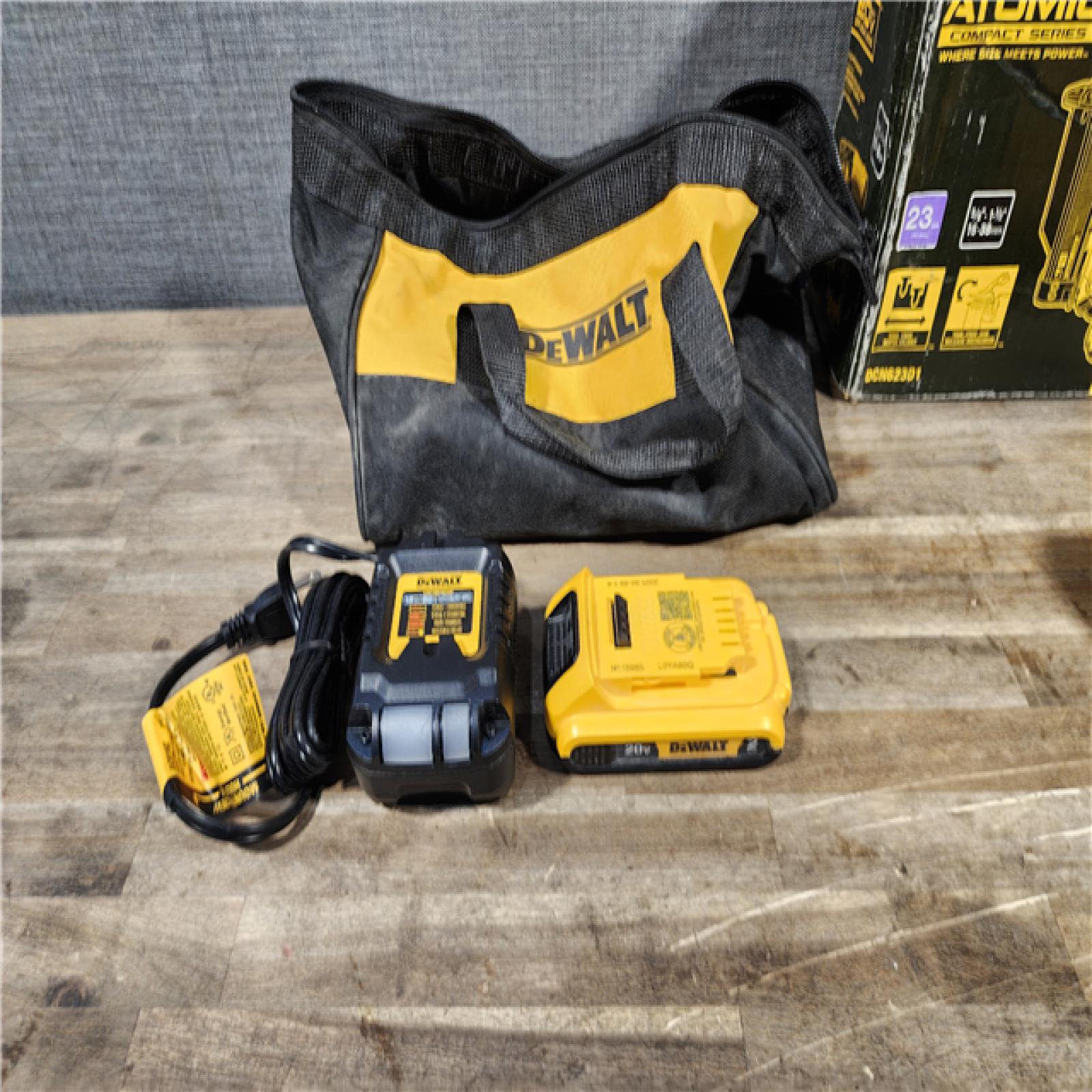 HOUSTON LOCATION - AS-IS DEWALT ATOMIC 20V MAX Lithium Ion Cordless 23 Gauge Pin Nailer Kit with 2.0Ah Battery and Charger