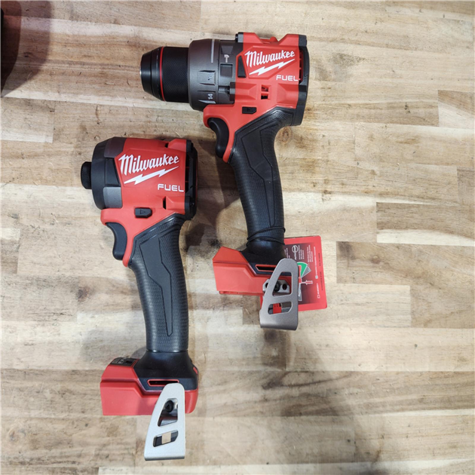 HOUSTON LOCATION - AS-IS (APPEARS LIKE NEW) Milwaukee  FUEL 18V Lithium-Ion Brushless Cordless Hammer Drill and Impact Driver Combo Kit