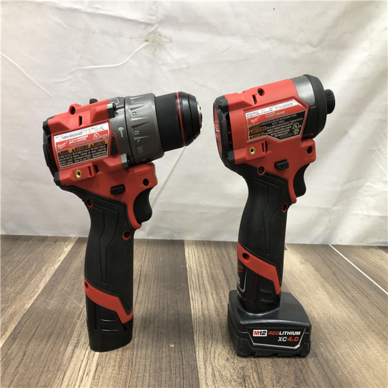 AS-IS Milwaukee FUEL 12-Volt Lithium-Ion Brushless Cordless Hammer Drill and Impact Driver Combo Kit