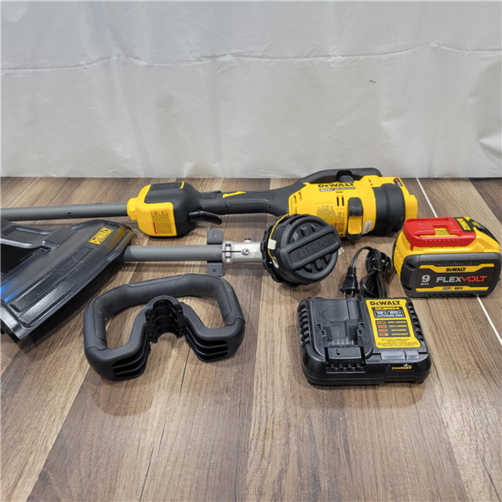 AS-IS  DEWALT FLEXVOLT 60V MAX 17 in. Cordless Battery Powered Attachment Capable Trimmer Kit with (1) FLEXVOLT 3 Ah Battery & Charger