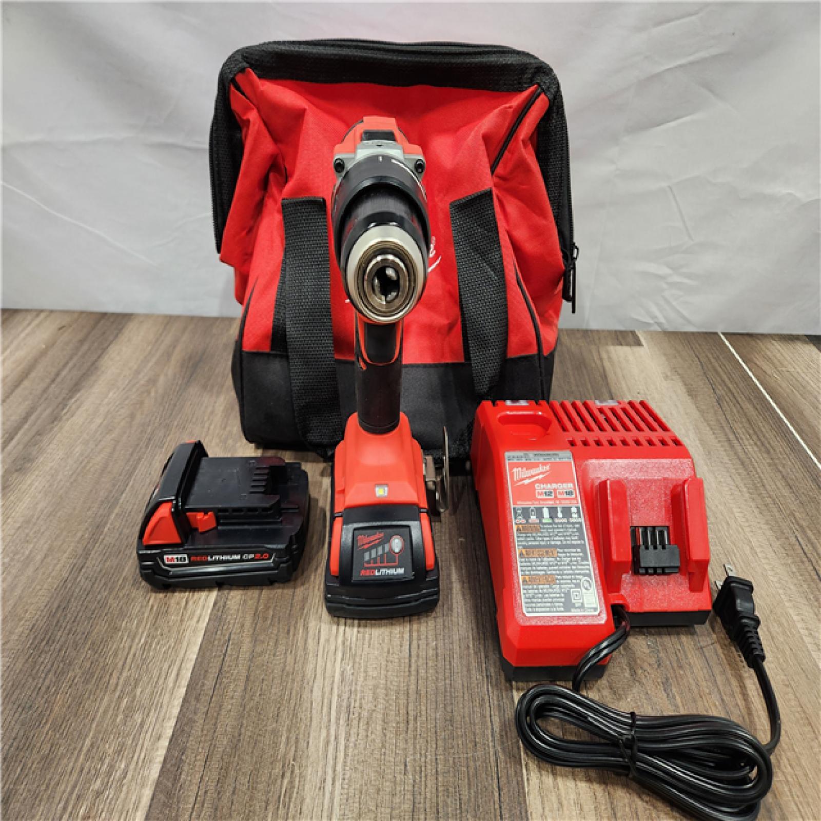 AS-IS -  Milwaukee M18 18V Lithium-Ion Brushless Cordless 1/2 in. Compact Drill/Driver Kit with Two 2.0 Ah Batteries, Charger and Case