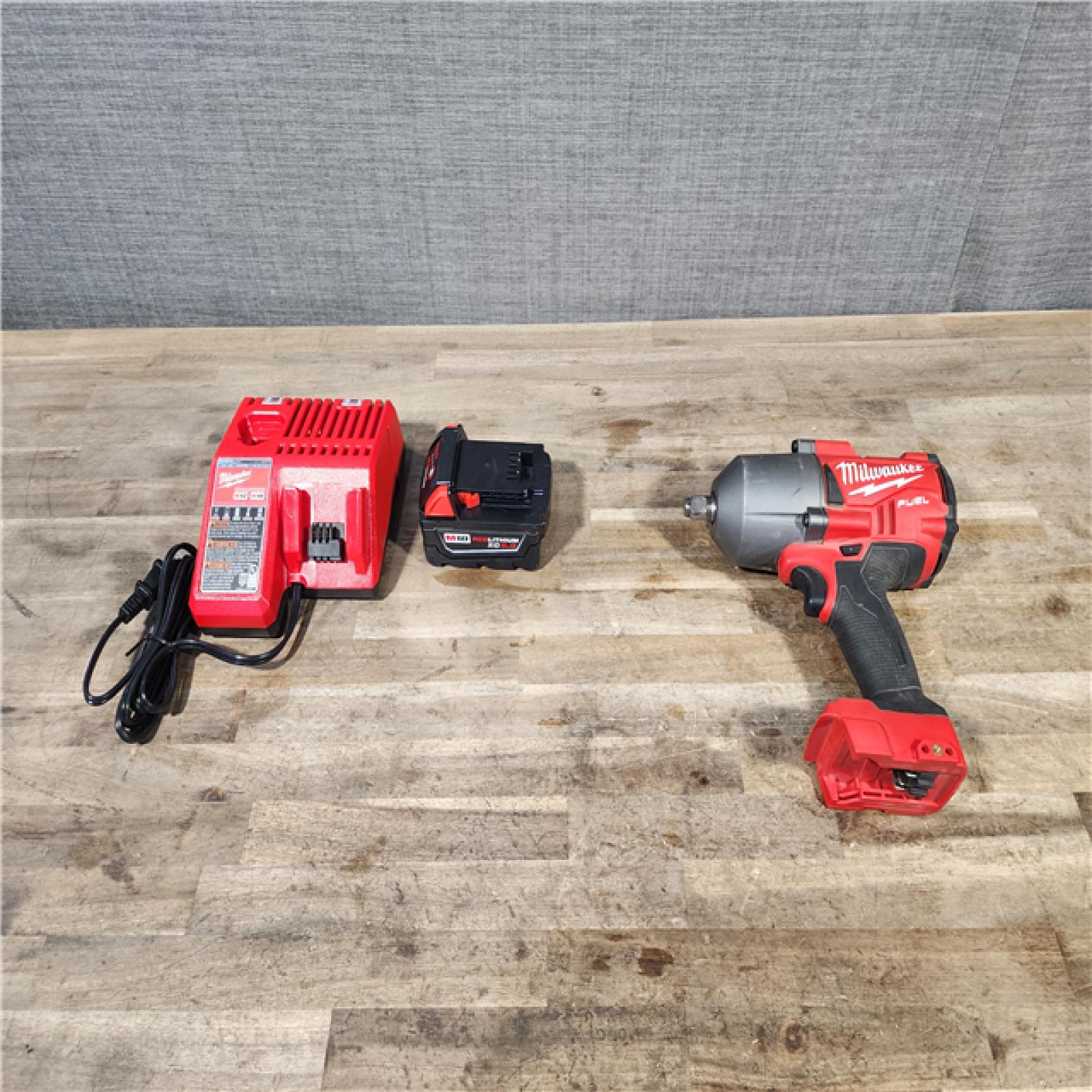 HOUSTON LOCATION - AS-IS Milwaukee M18 FUEL 1/2 in. Cordless Brushless Impact Wrench Kit (Battery & Charger)