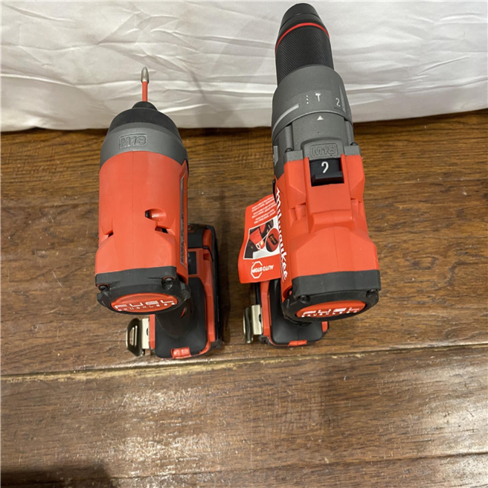 AS-IS MILWAUKEE M18 FUEL 18V Lithium-Ion Brushless Cordless Hammer Drill and Impact Driver Combo Kit (2-Tool) with 2 Batteries