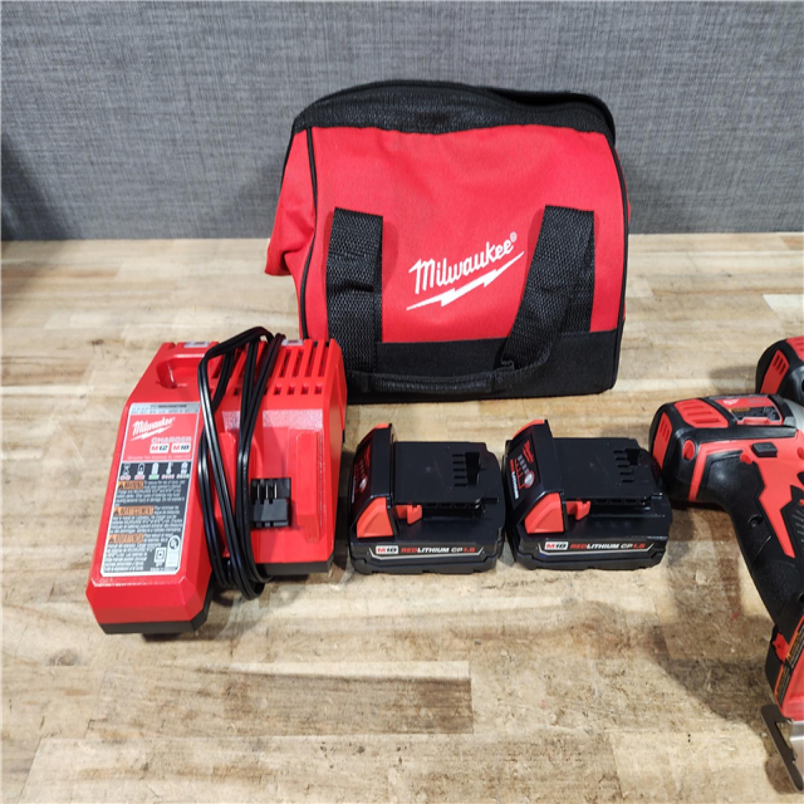 HOUSTON LOCATION - AS - IS Milwaukee 18V Lithium-Ion Cordless Drill Driver/Impact Driver Combo Kit