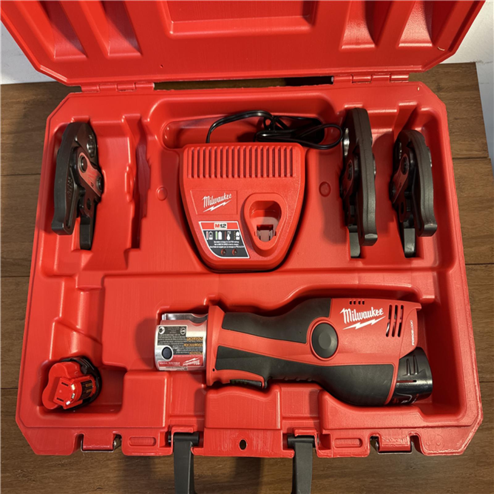 California AS-IS Milwaukee M12 Force Logic Press Tool Kit  Includes (2) Batteries  Charger and Hard Case