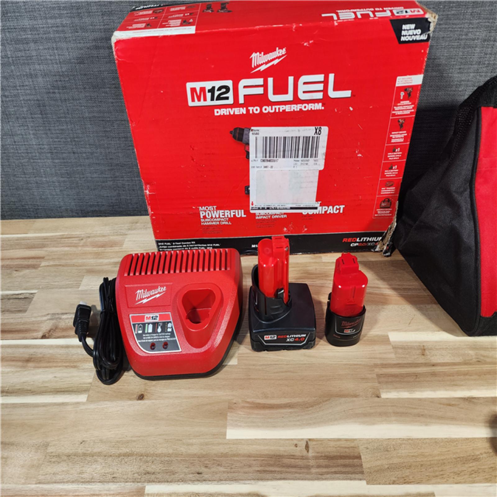 HOUSTON LOCATION - AS-IS (APPEARS LIKE NEW) Milwaukee 3497-22 12V Brushless Hammer Drill and Impact Driver Combo Kit