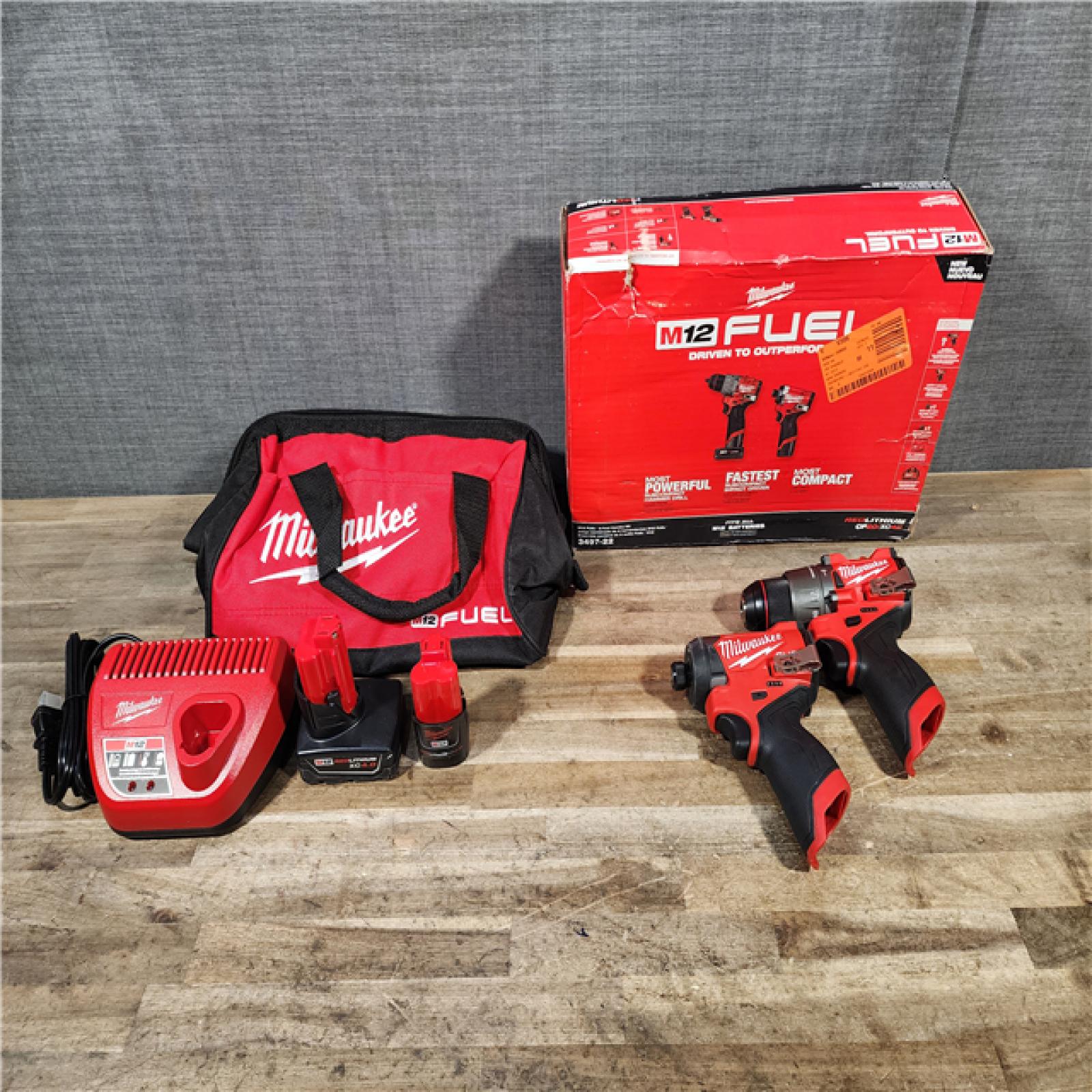 HOUSTON LOCATION - AS-IS Milwaukee FUEL 12-Volt Lithium-Ion Brushless Cordless Hammer Drill and Impact Driver Combo Kit
