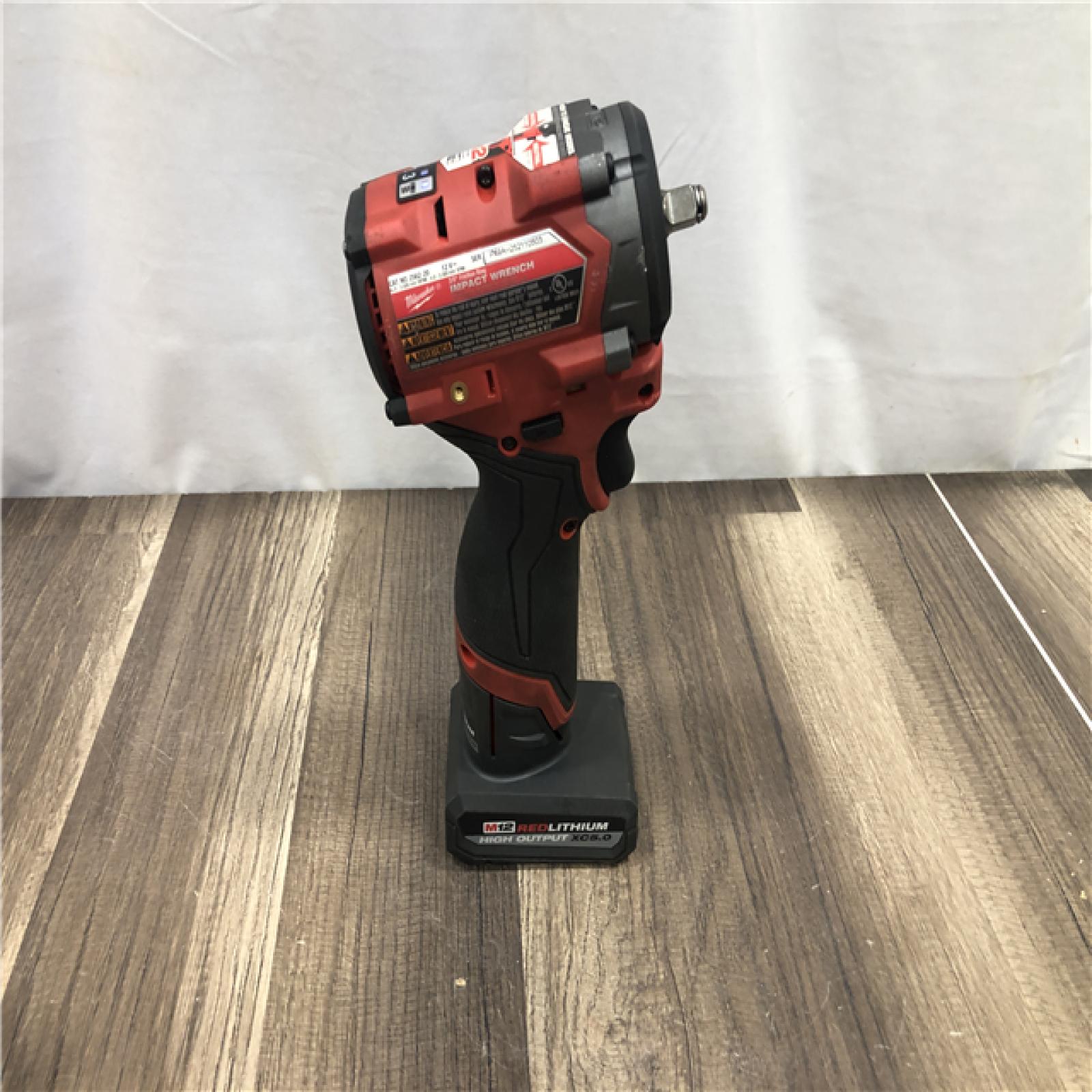 AS-IS Milwaukee FUEL 12V Li-Ion Brushless Cordless Stubby 3/8 in. Impact Wrench Kit