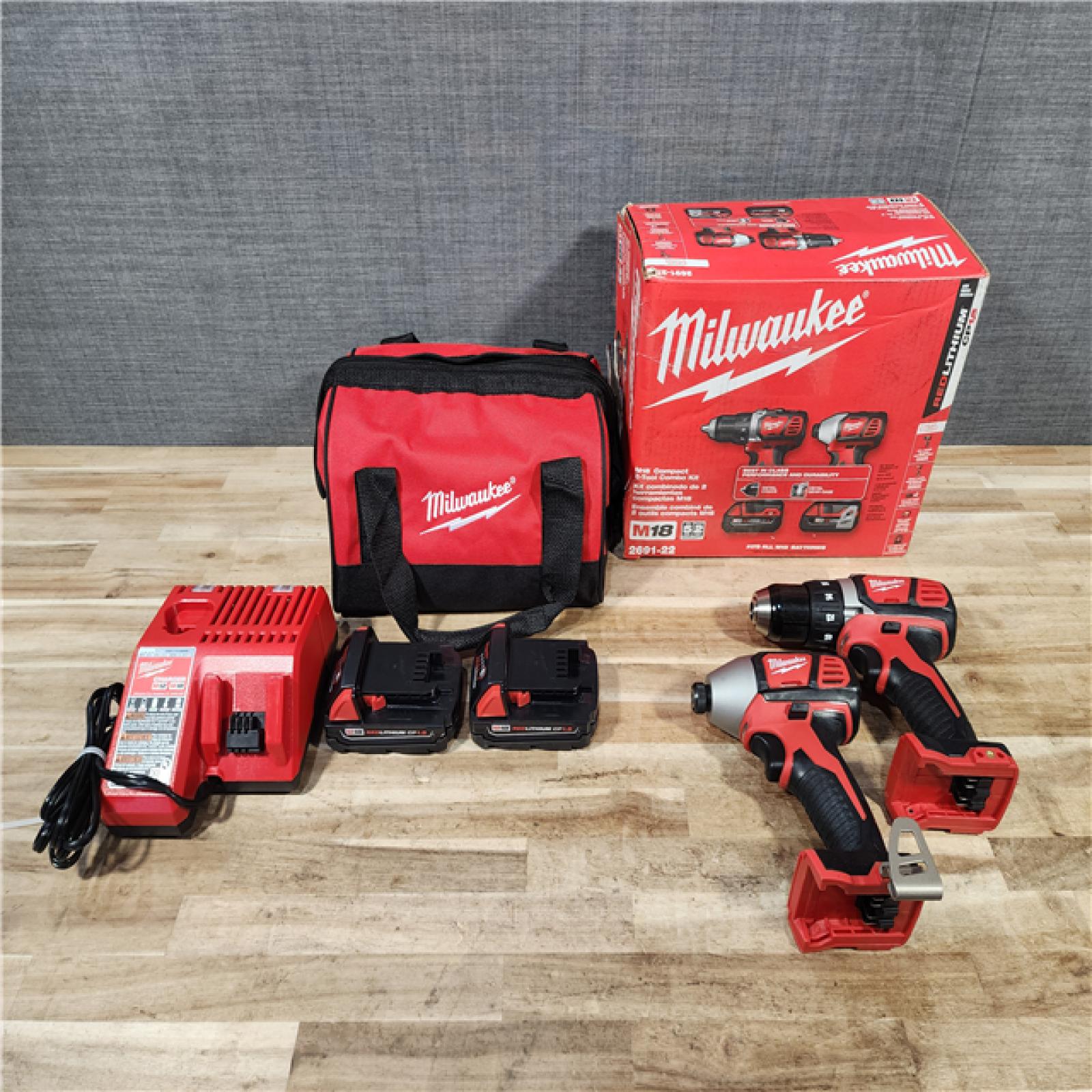 HOUSTON LOCATION - AS-IS Milwaukee 18V Lithium-Ion Cordless Drill Driver/Impact Driver Combo Kit