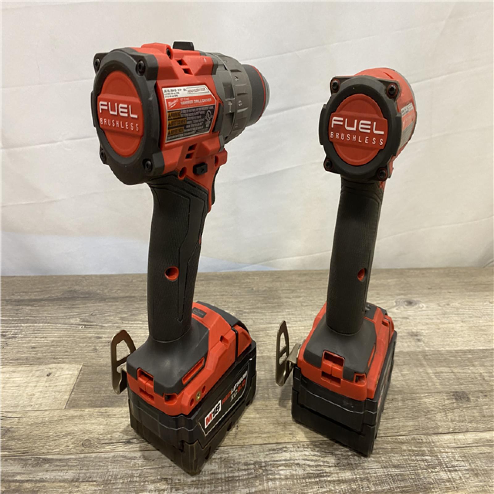 AS-IS Milwaukee FUEL 18V Lithium-Ion Brushless Cordless Hammer Drill and Impact Driver Combo Kit (2-Tool) with 2 Batteries