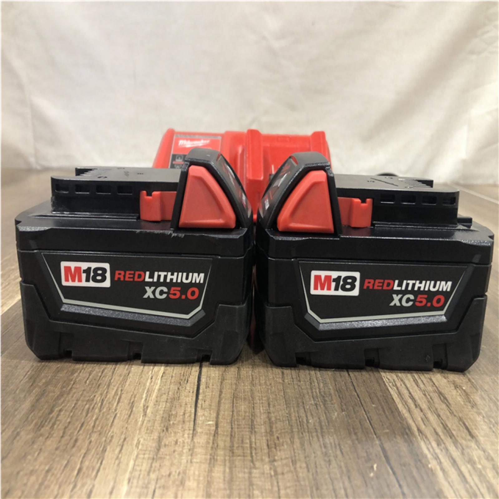 AS-IS Milwaukee 18-Volt Lithium-Ion XC Starter Kit with (2) 5.0Ah Batteries and Charger