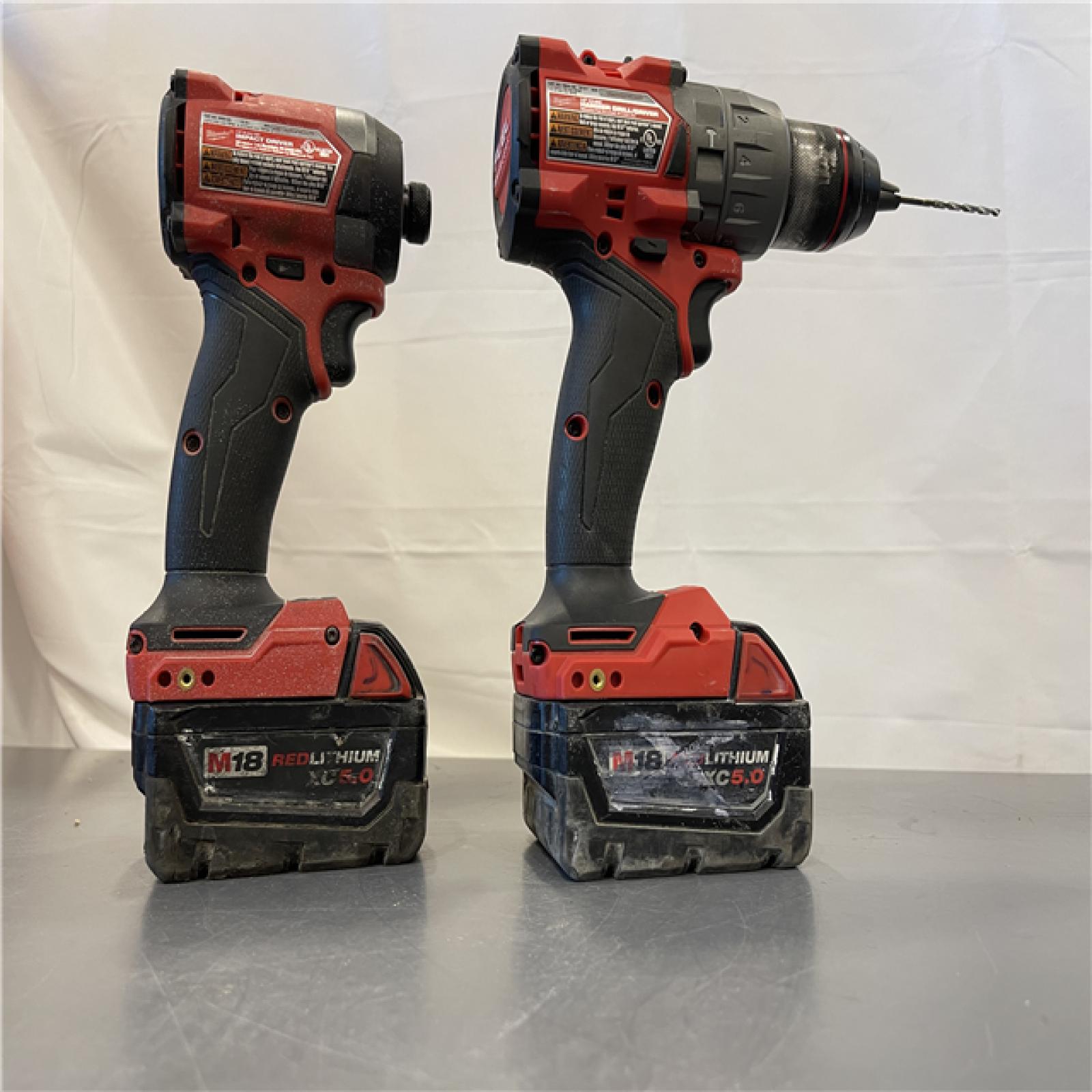 AS-IS - MILWAUKEE FUEL 18V Lithium-Ion Brushless Cordless Hammer Drill and Impact Driver Combo Kit (2-Tool) with 2 Batteries