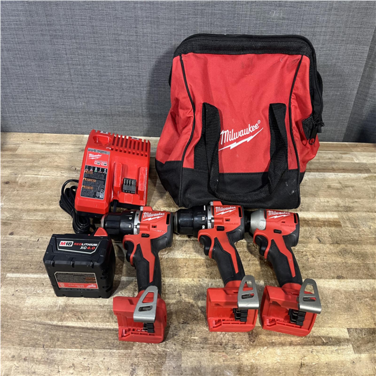 Houston Location AS-IS Milwaukee Hammer Drill Drivers QTY/2 and Impact Driver and Battery with Charger