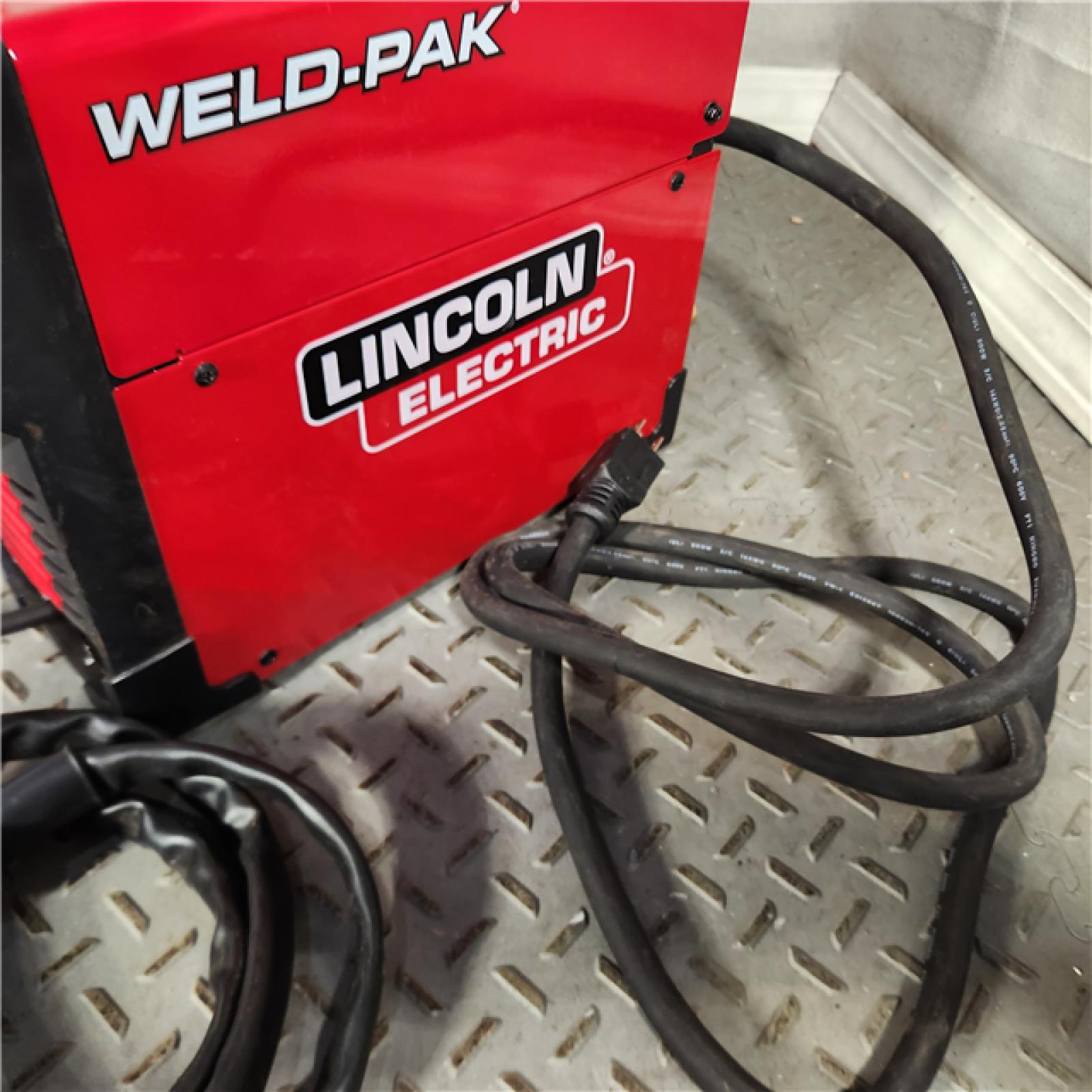 Houston location - AS-IS Lincoln Electric WELD-PAK 90i MIG and Flux-Cored Wire Feeder Welder with Gas Regulator - Appears IN GOOD Condition
