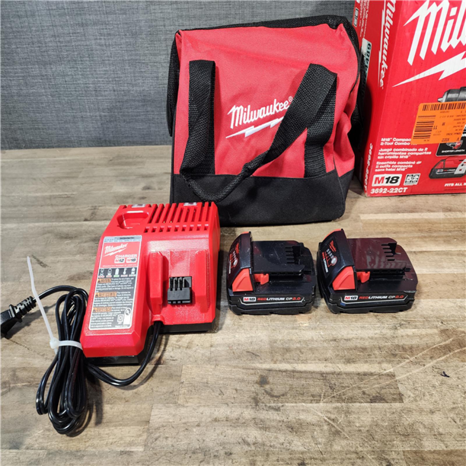 HOUSTON LOCATION - AS-IS Milwaukee M18 18V Lithium-Ion Brushless Cordless Compact Drill/Impact Combo Kit (2-Tool) W/(2) 2.0 Ah Batteries  Charger & Bag