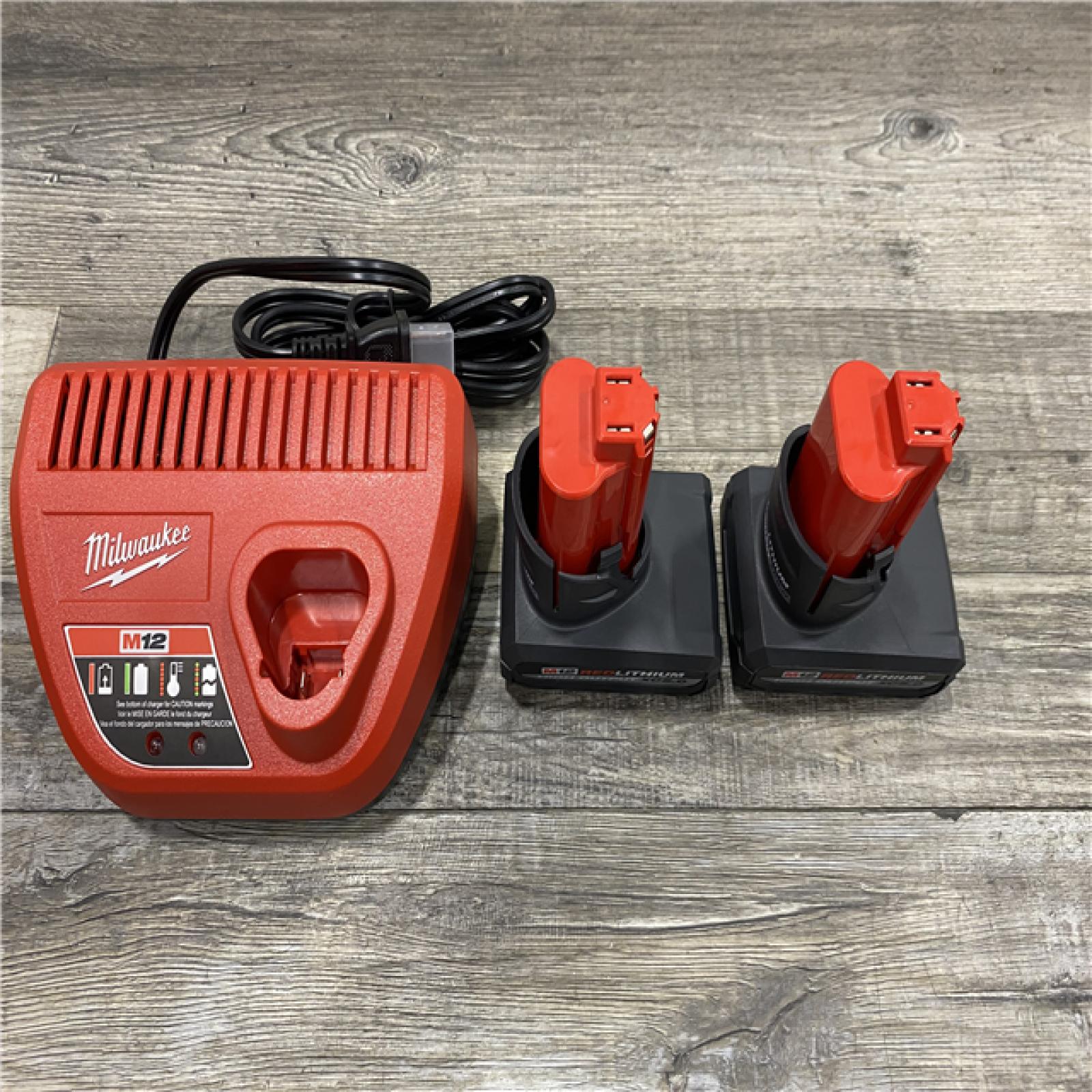 AS-IS Milwaukee 12V Lithium-Ion XC High Output 5.0 Ah Battery Pack (2-Pack) Starter Kit with Charger