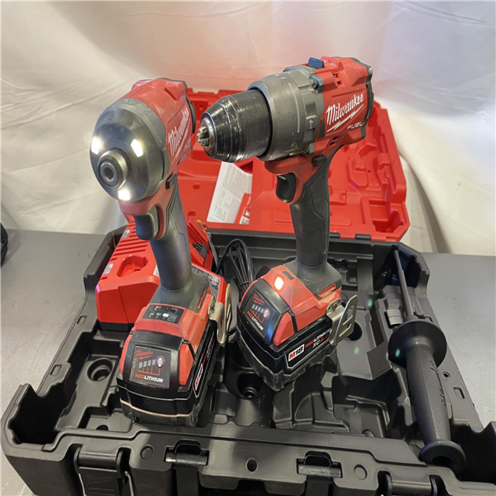 AS-IS - MILWAUKEE FUEL 18V Lithium-Ion Brushless Cordless Hammer Drill and Impact Driver Combo Kit