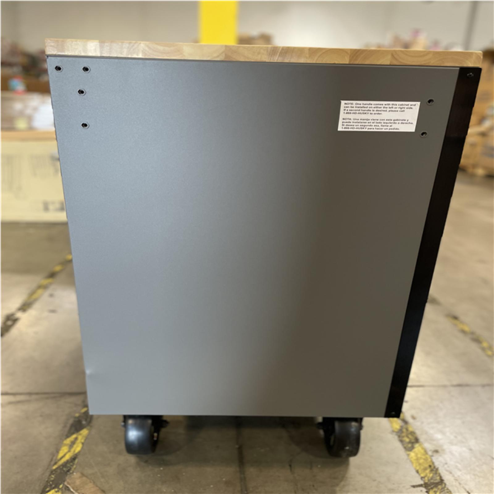DALLAS LOCATION- AS-IS HUSKY 61 in. W x 22 in. D 15-Drawer Mobile Workbench (MATTE GRAY/ WOODTOP)