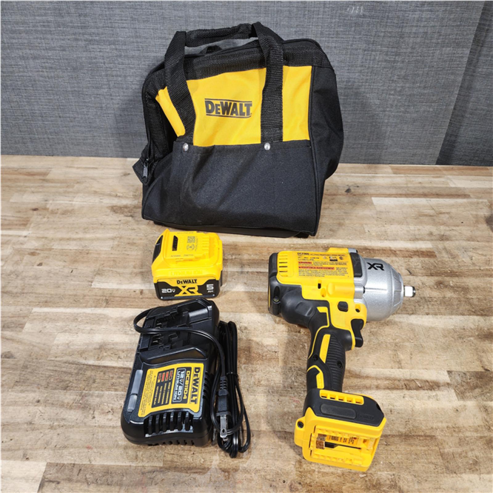 Houston Location AS-IS DeWalt XR Impact and Battery with Charger