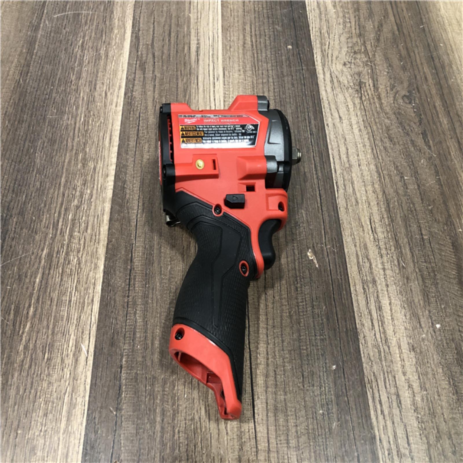 AS-IS Milwaukee FUEL 12V Lithium-Ion Brushless Cordless Stubby 3/8 in. Impact Wrench (Tool-Only)