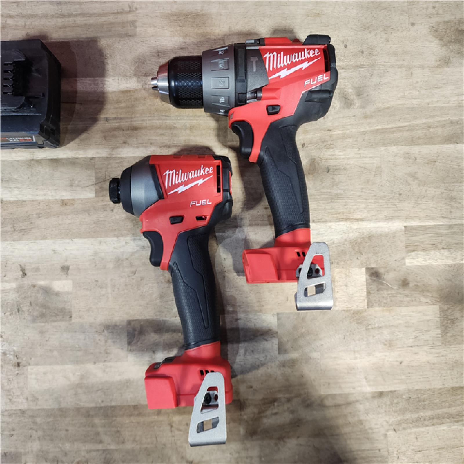 HOUSTON LOCATION - AS-IS Milwaukee M18 FUEL 18-Volt Lithium-Ion Brushless Cordless Hammer Drill & Impact Driver Combo Kit (2-Tool) w/(2) 5Ah Batteries
