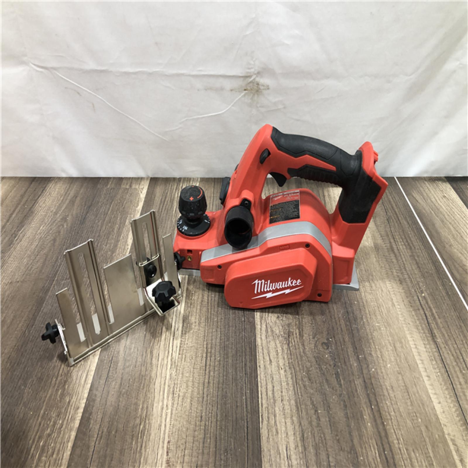 AS-IS Milwaukee M18 18V Lithium-Ion Cordless 3-1/4 in. Planer (Tool-Only)