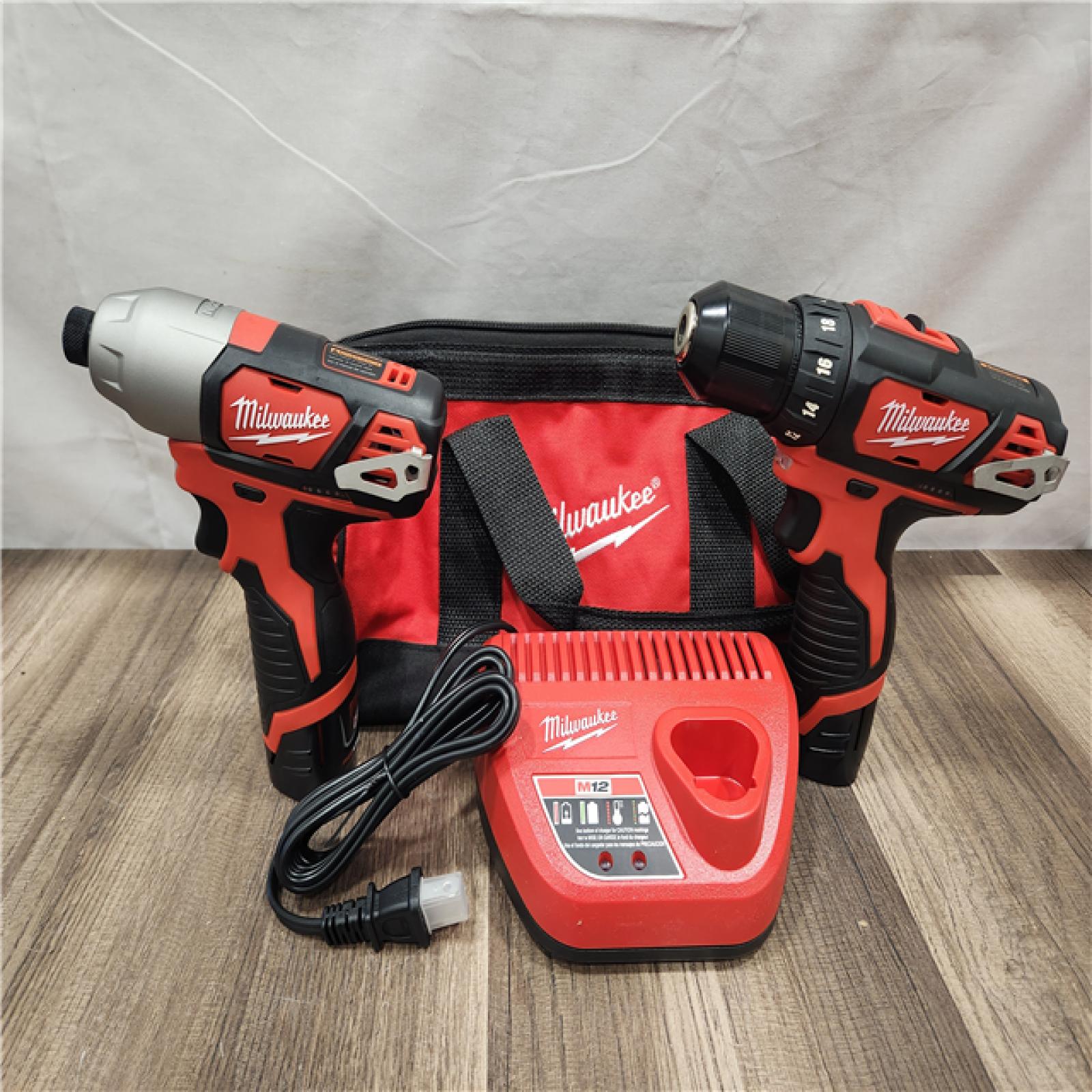 AS-IS- Milwaukee M12 Cordless Combination 3/8  Drill / Driver and 1/4  Hex Impact Driver Dual Power Tool Kit (2 Lithium Ion Batteries  Charger  and B