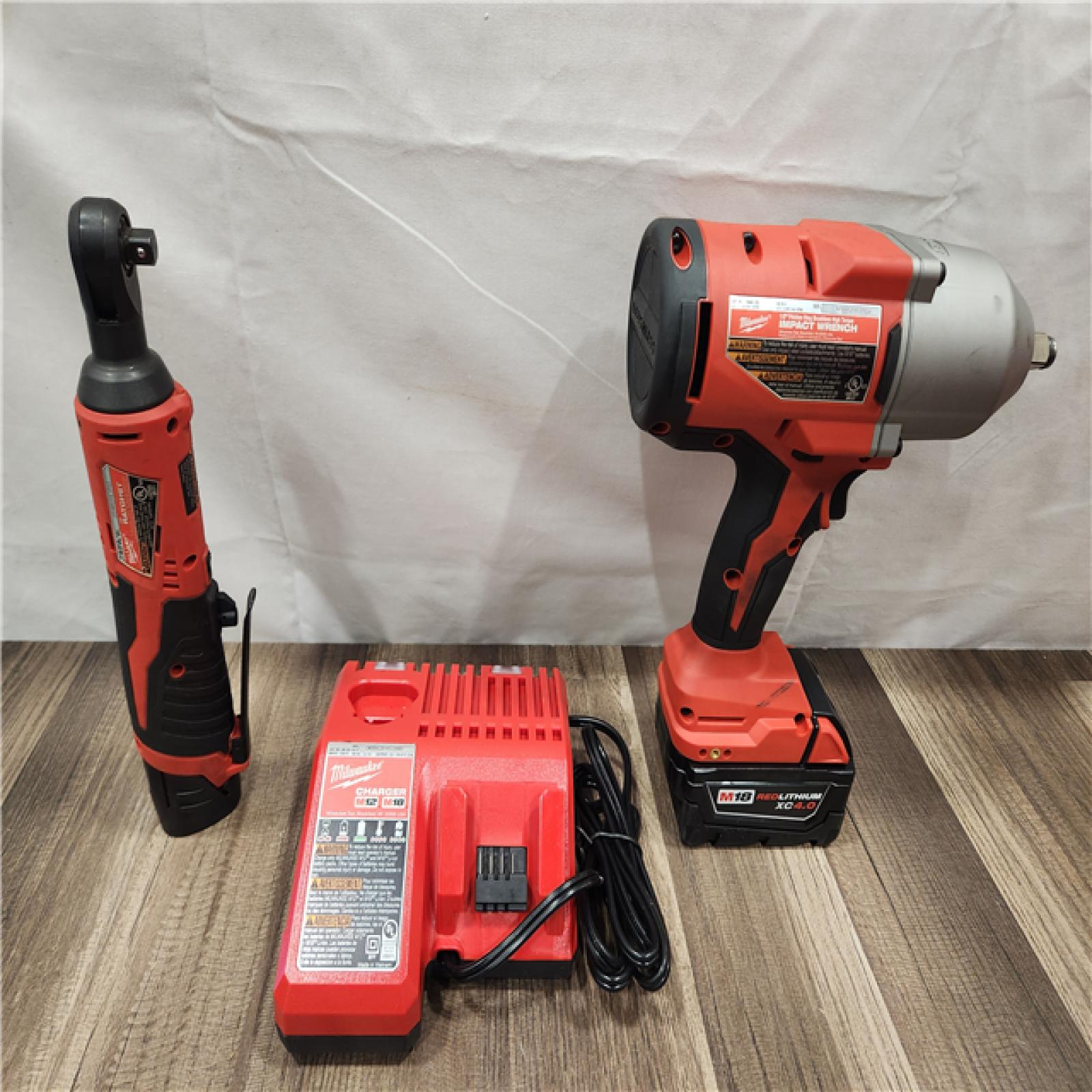 AS-IS- Milwaukee M12/M18 12/18V Lithium-Ion Cordless 3/8 in. Ratchet and 1/2 in. High Torque Impact Wrench with Friction Ring Combo Kit