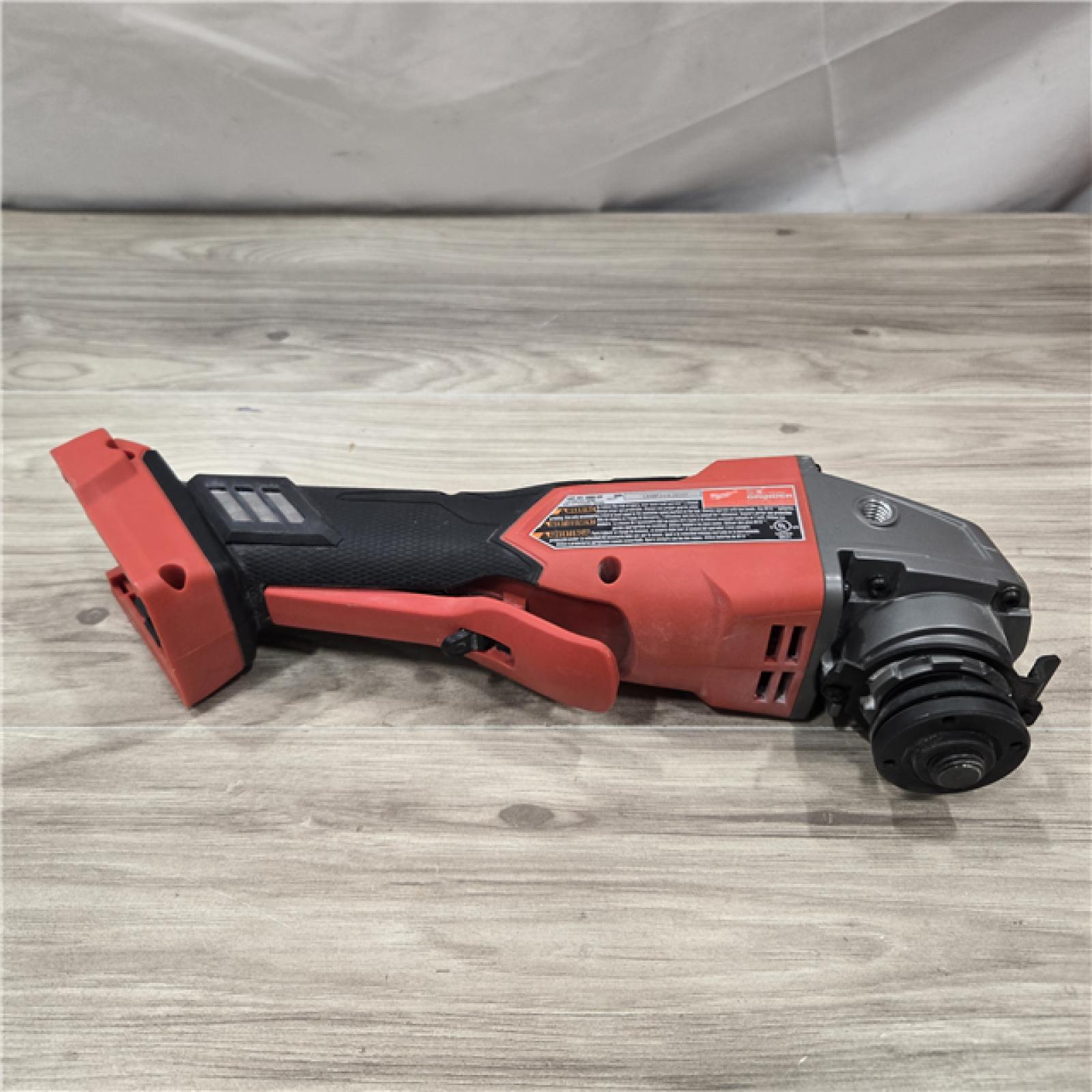 AS-IS Milwaukee 2880-20 FUEL 18V Cordless 4-1/2 in./5 in. Grinder  (Tool-Only)