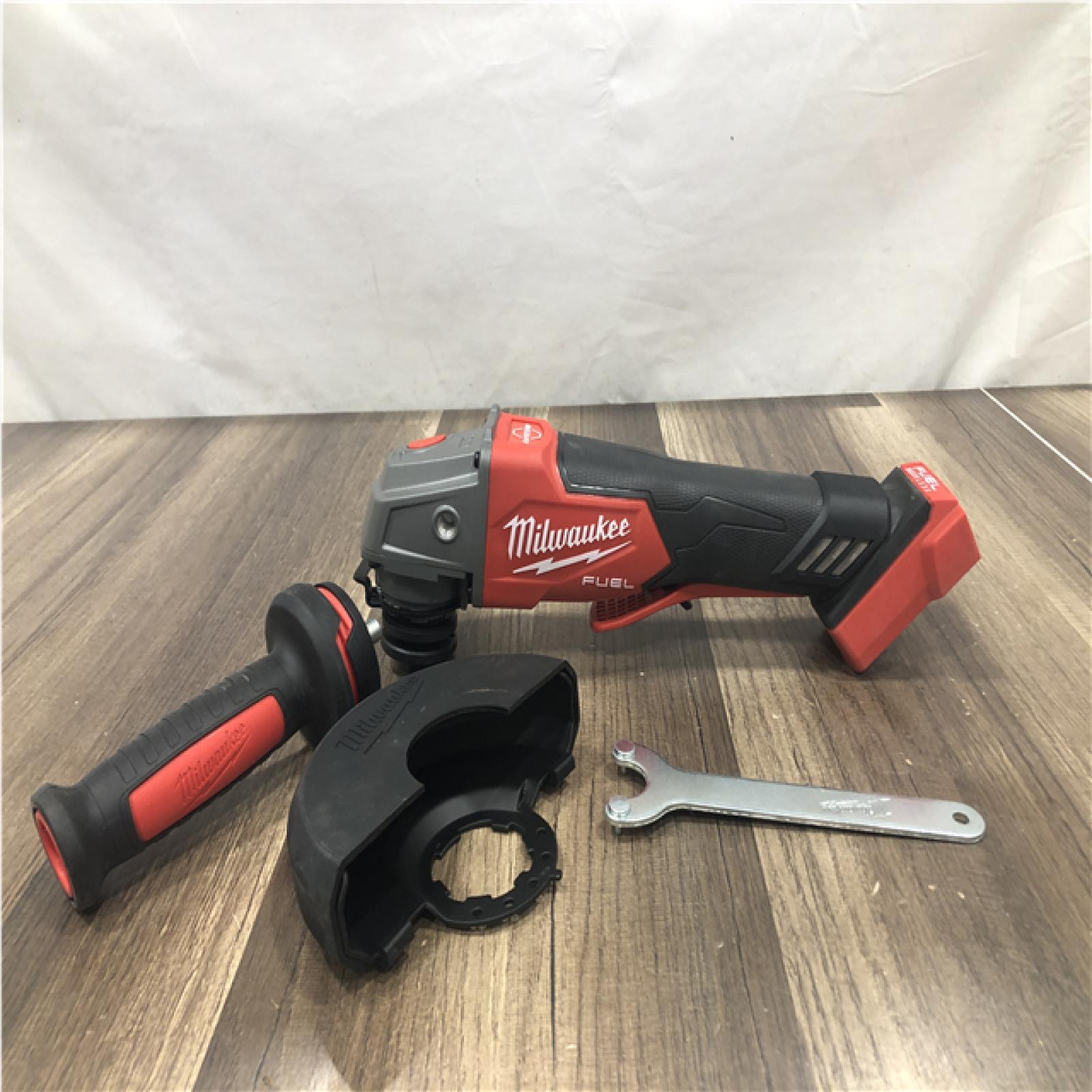 AS-IS Milwaukee FUEL 18V Lithium-Ion Brushless Cordless 4-1/2 in./5 in. Grinder w/Paddle Switch (Tool-Only)