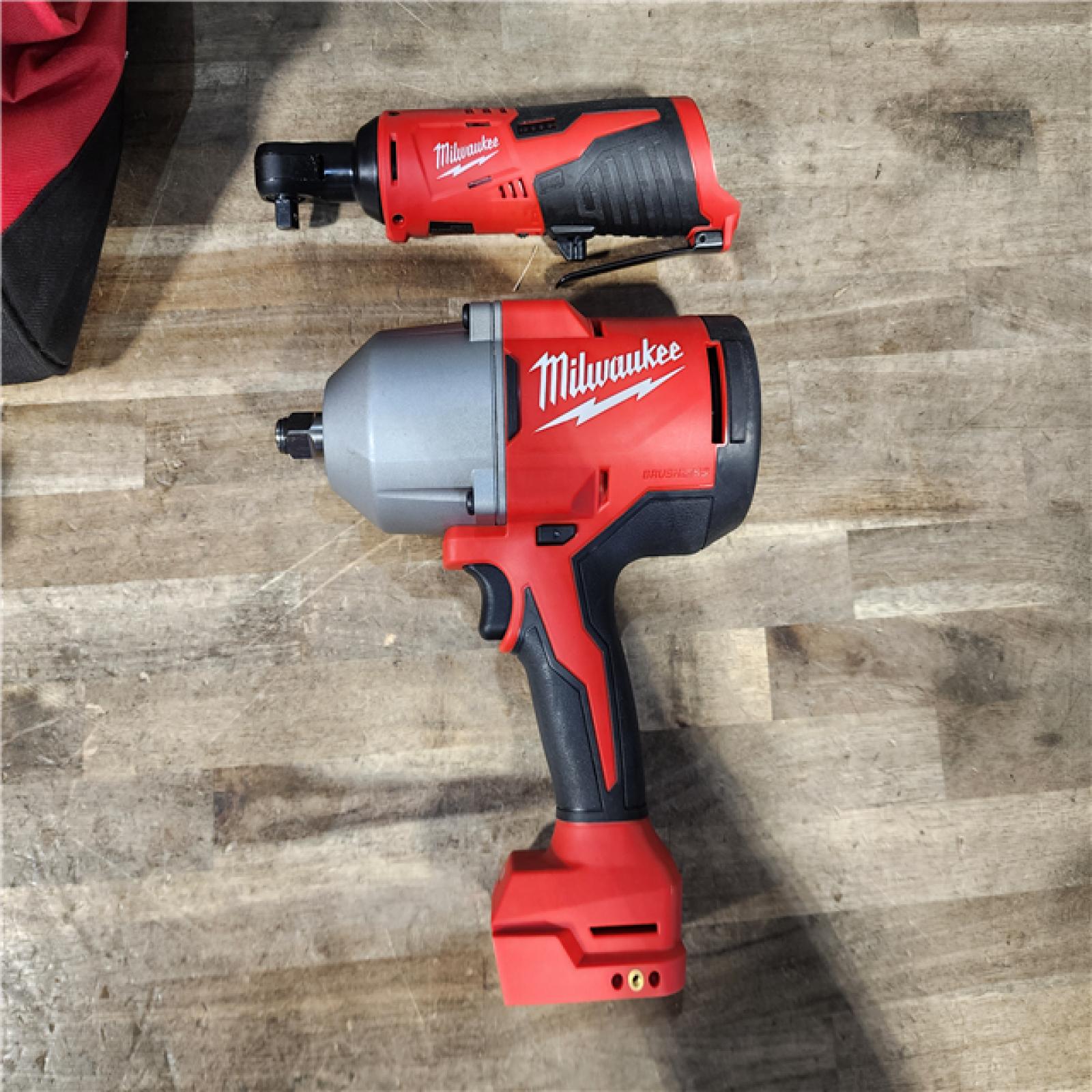HOUSTON LOCATION - AS-IS Milwaukee 12/18V Lithium-Ion Cordless 3/8 in. Ratchet and 1/2 in. High Torque Impact Wrench with Friction Ring Combo Kit