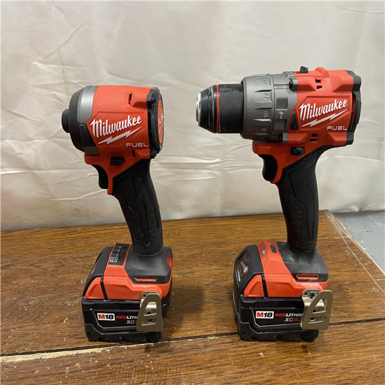 AS- IS MILWAUKEE M18 FUEL 18V Lithium-Ion Brushless Cordless Hammer Drill and Impact Driver Combo Kit (2-Tool) with 2 Batteries