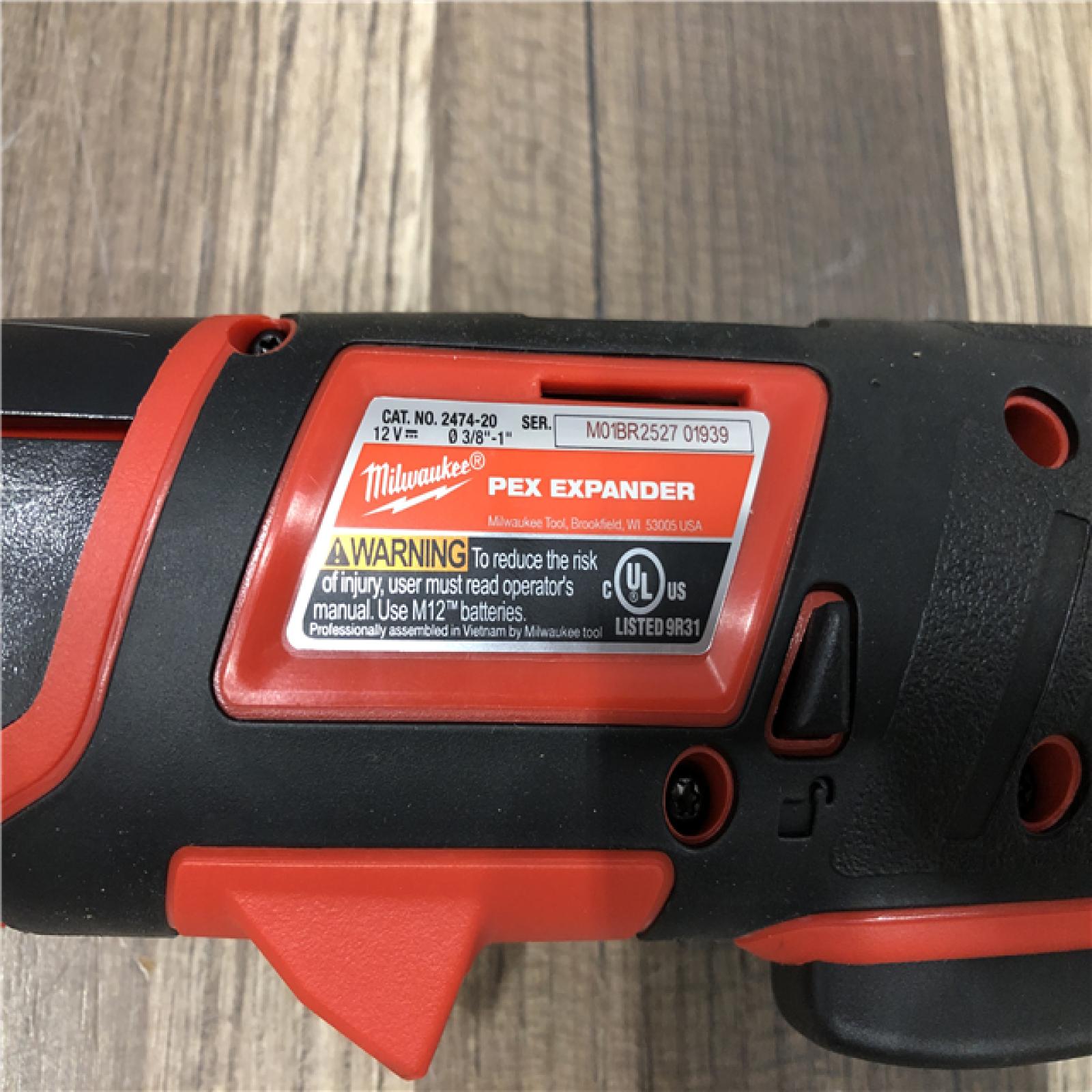 AS-IS Milwaukee M12 Cordless PEX Expansion Tool Kit with 1 in. Plastic Tubing Cutter