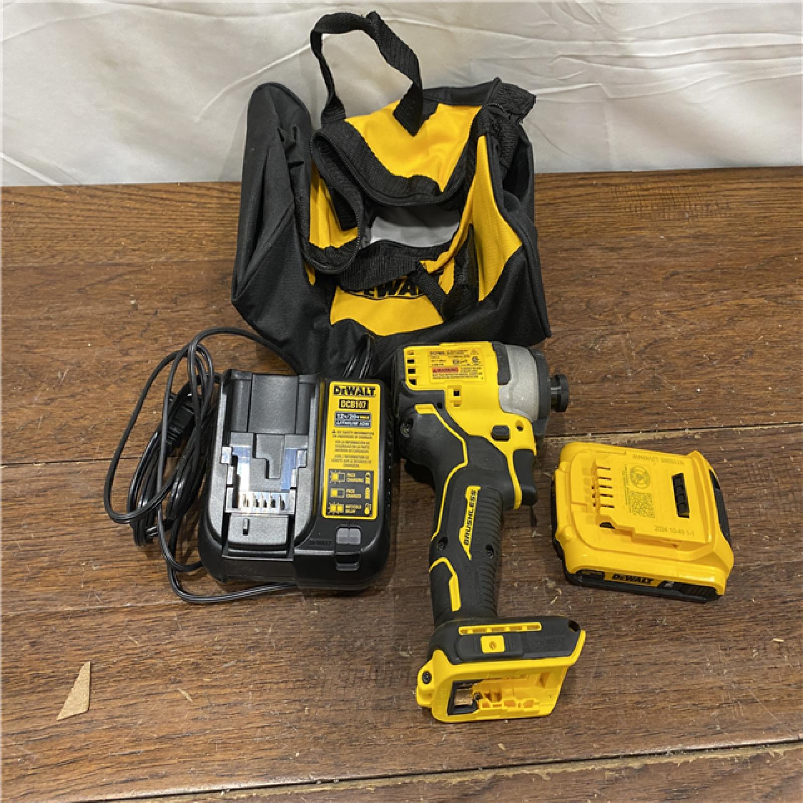 AS-IS DEWALT ATOMIC 20V MAX* Brushless Cordless Compact 1/4 in. Impact Driver Kit